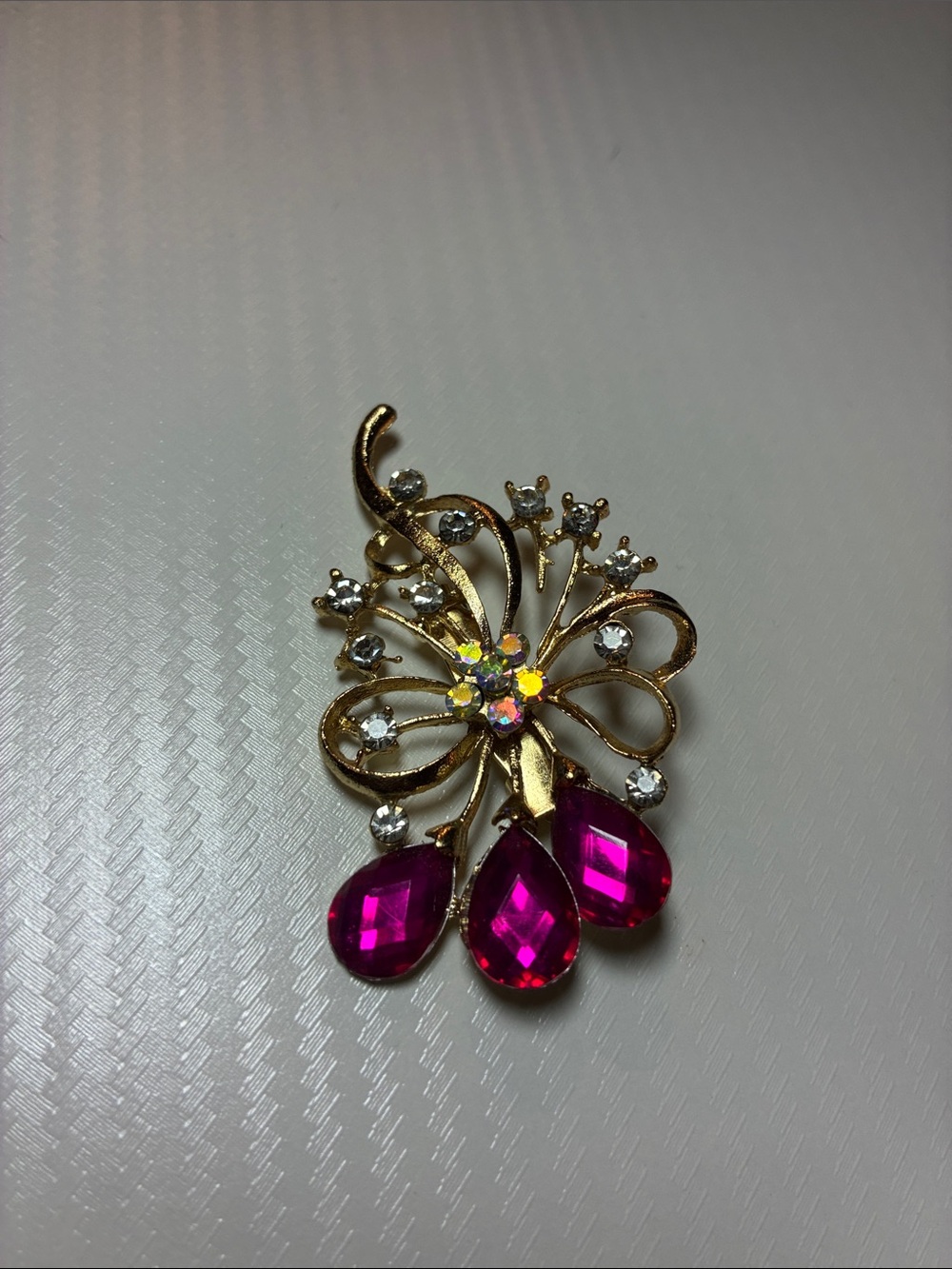 Vintage Gold Tone Floral Rhinestone Brooch with Ruby Red Teardrop Crystals